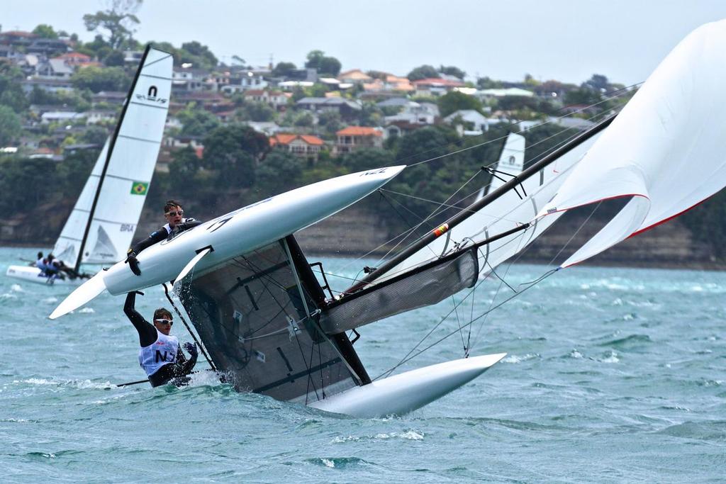 Kiwi Nacra 15 NZL capsizes when leading - Aon Youth Worlds 2016, Torbay, Auckland, New Zealand © Richard Gladwell www.photosport.co.nz